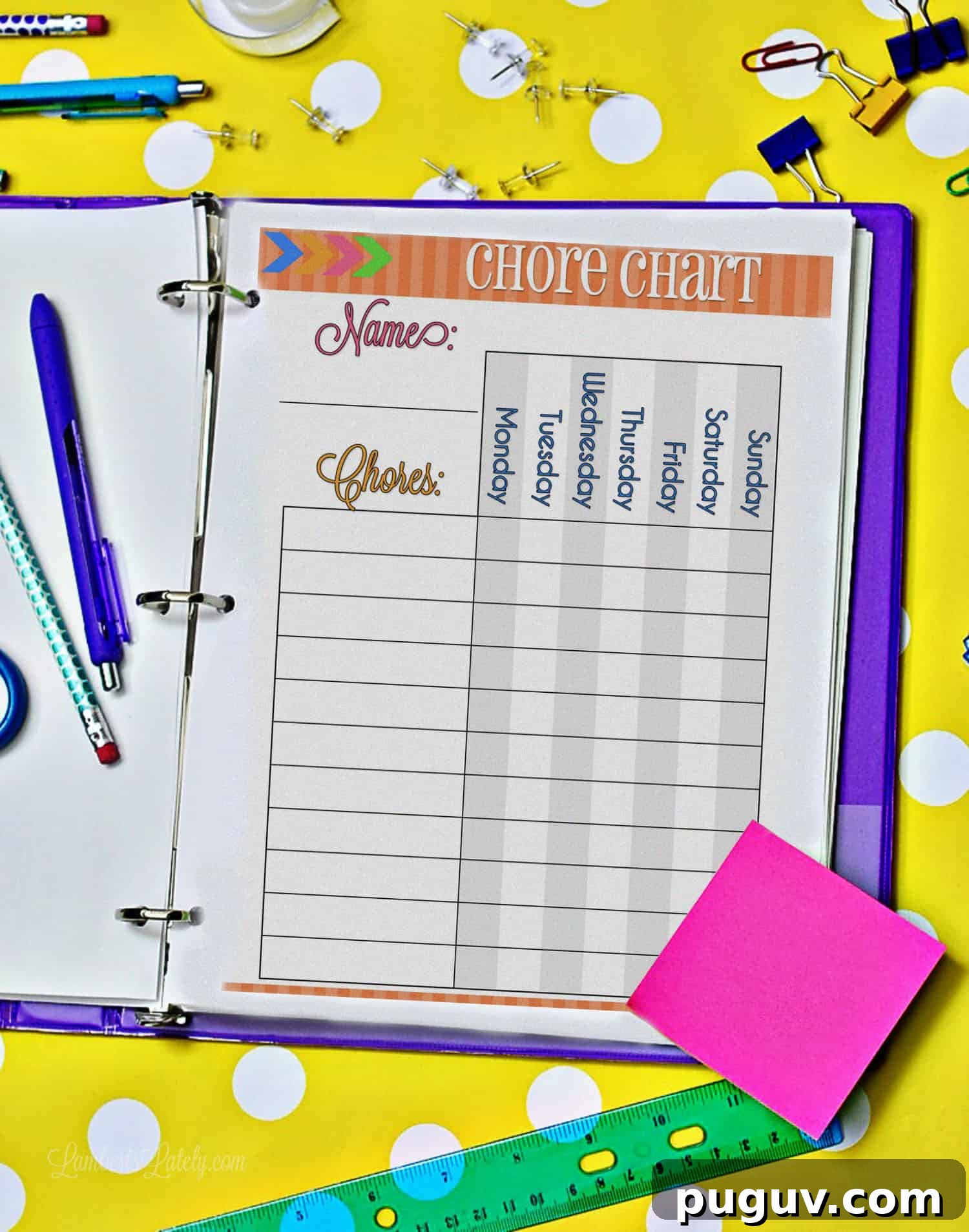 chore chart printable in a notebook on a desk.