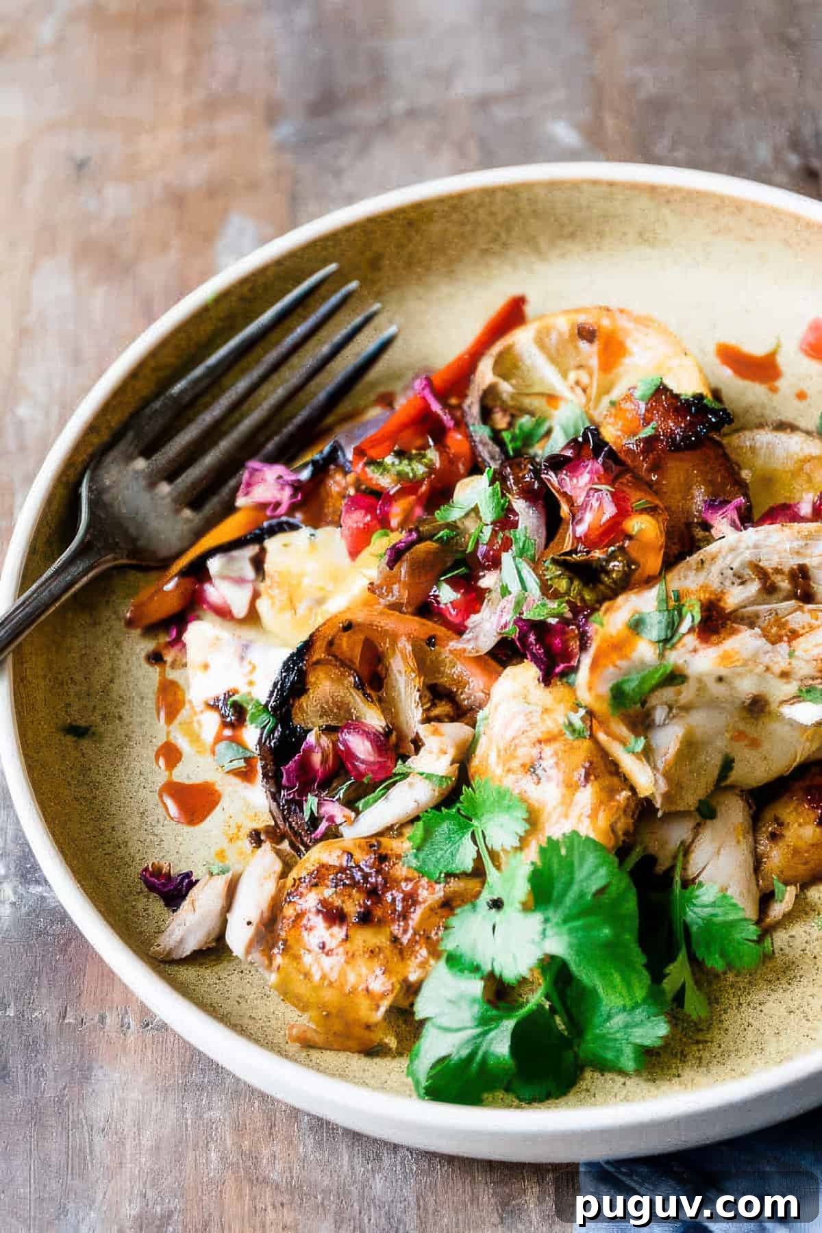 Sheet Pan Harissa Chicken with Roasted Potatoes 3 Harissa chicken with vegetables and potatoes.