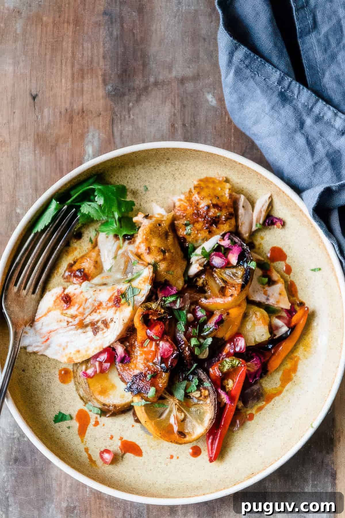 Sheet Pan Harissa Chicken with Roasted Potatoes 4 Harissa chicken with vegetables and potatoes.