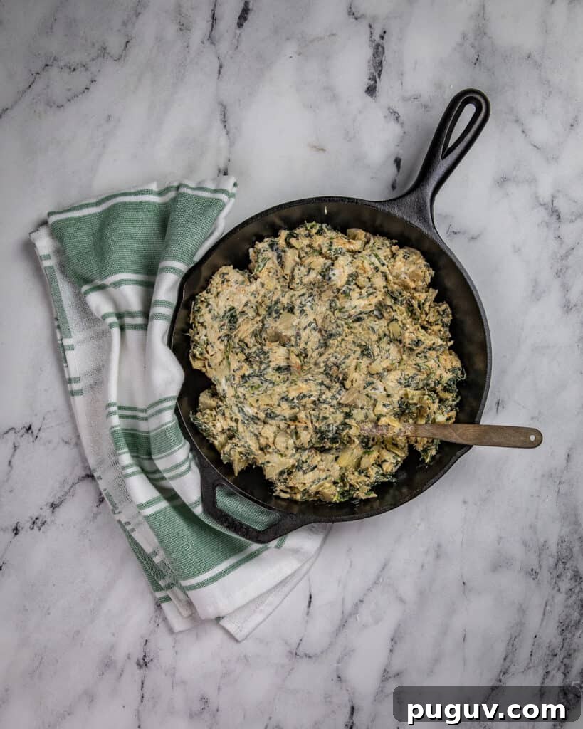Smoky Three-Cheese Spinach Artichoke Dip Recipe 5 Transfer to skillet