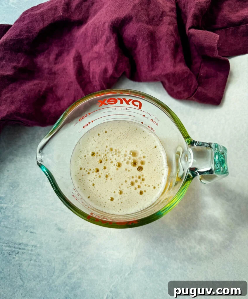 Creamy Bacon and Beer Cheese Soup Recipe 4 beer in a glass measuring cup