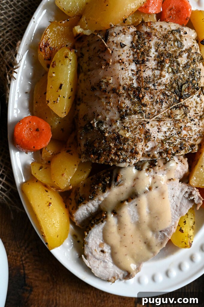 Pork roast with Greek roasted potatoes