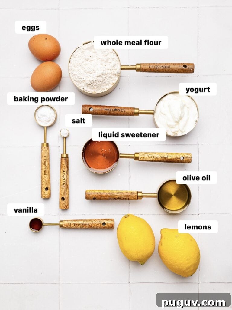 Lemon Drizzle Muffins That Actually Taste Indulgent 5 Lemon Drizzle Muffins ingredients in measuring cups.