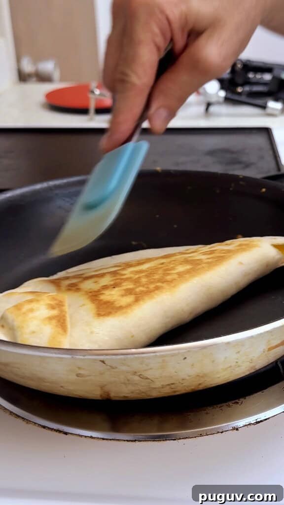 15-Minute Egg & Cheese Breakfast Quesadilla Recipe 11 final quesadilla flip