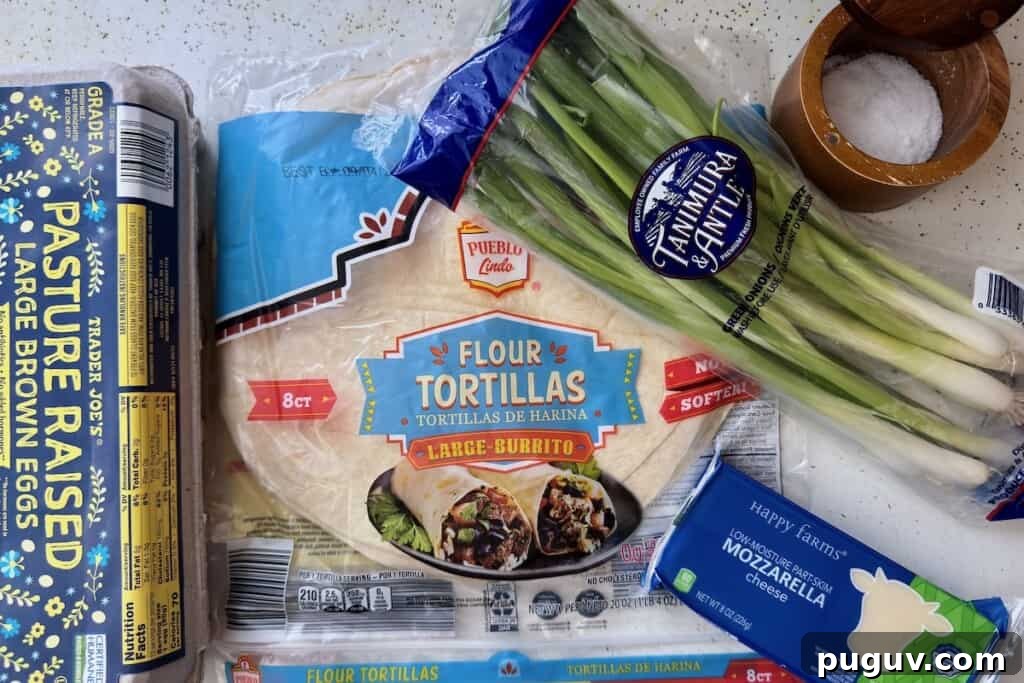 15-Minute Egg & Cheese Breakfast Quesadilla Recipe 3 ingredients on counter that are used to make egg and cheese quesadilla