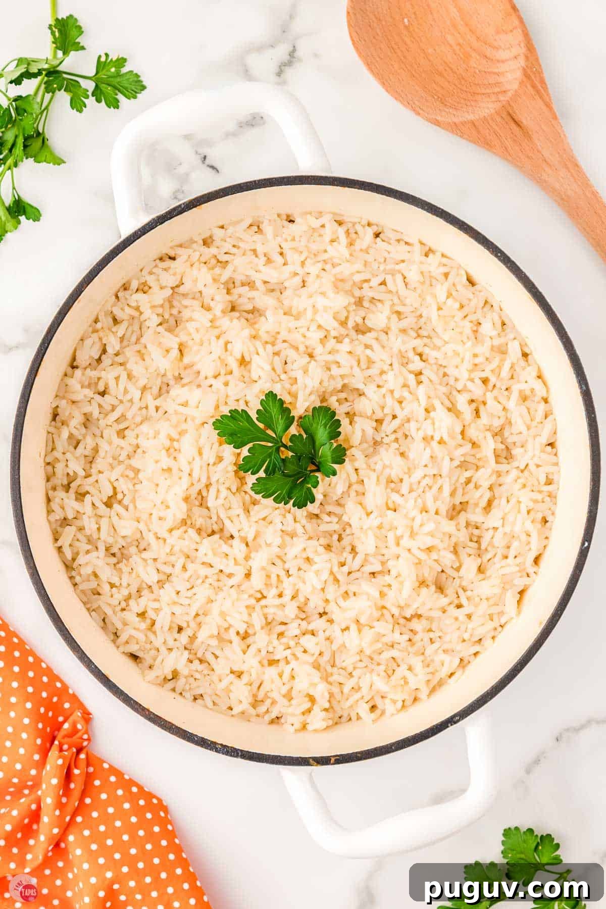 pot of cooked white rice with fresh parsley on top