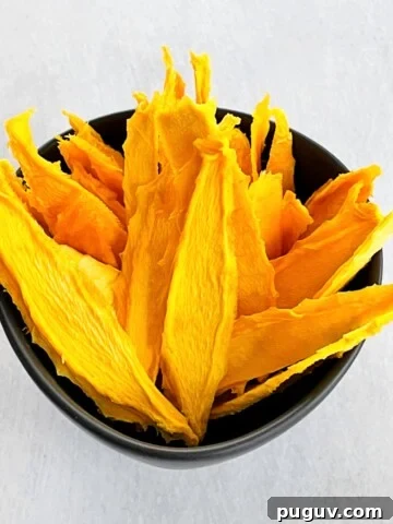 dehydrated mango slices in a bowl
