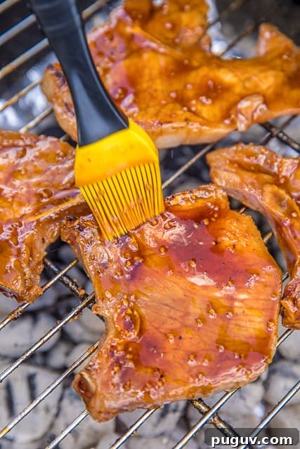 Grilled Huli Huli Pork Chops with Sweet Pineapple Glaze 2 Grilled Huli Huli Pork Chops on the grill