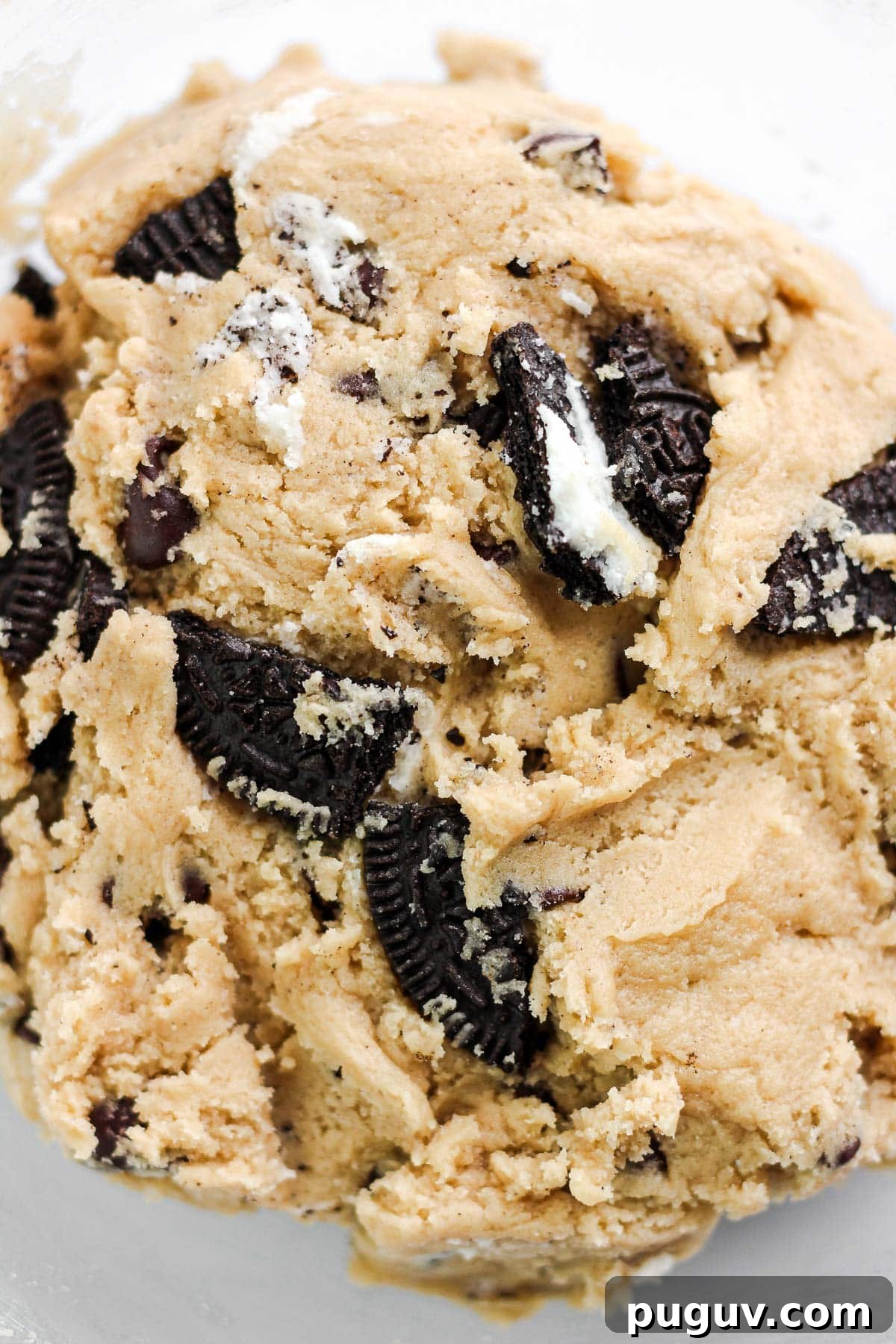 Oreo Chocolate Chip Cookie Recipe — Crispy, Chewy Treats 11 Folding in Oreos