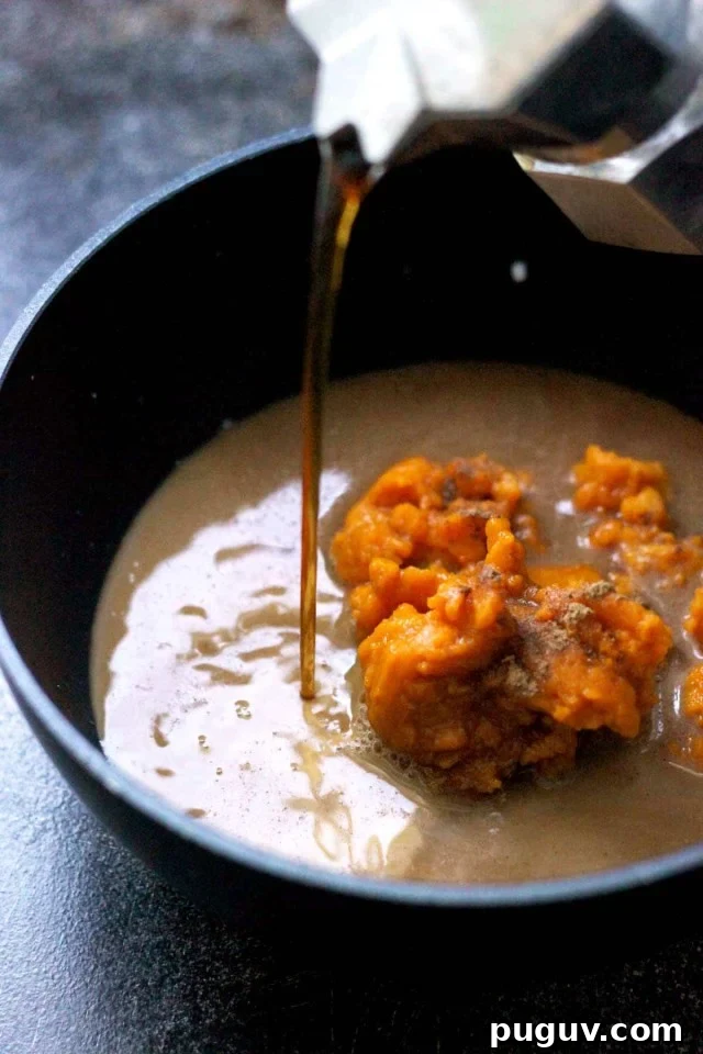 Healthy Vegan Pumpkin Spice Latte Pouring into a Saucepan