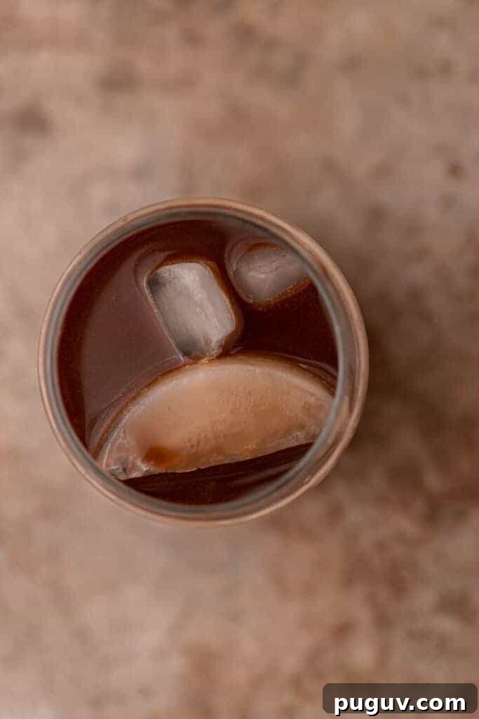 Chick-fil-A Mocha Cream Cold Brew: Homemade Copycat Recipe 6 Half and half, powdered sugar, and vanilla extract being whisked together to create sweet cream for iced coffee.