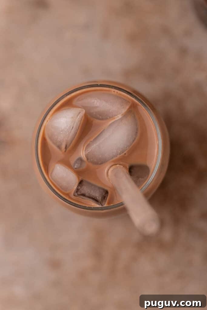 Chick-fil-A Mocha Cream Cold Brew: Homemade Copycat Recipe 8 Top view of mocha cold brew with ice cubes and straw