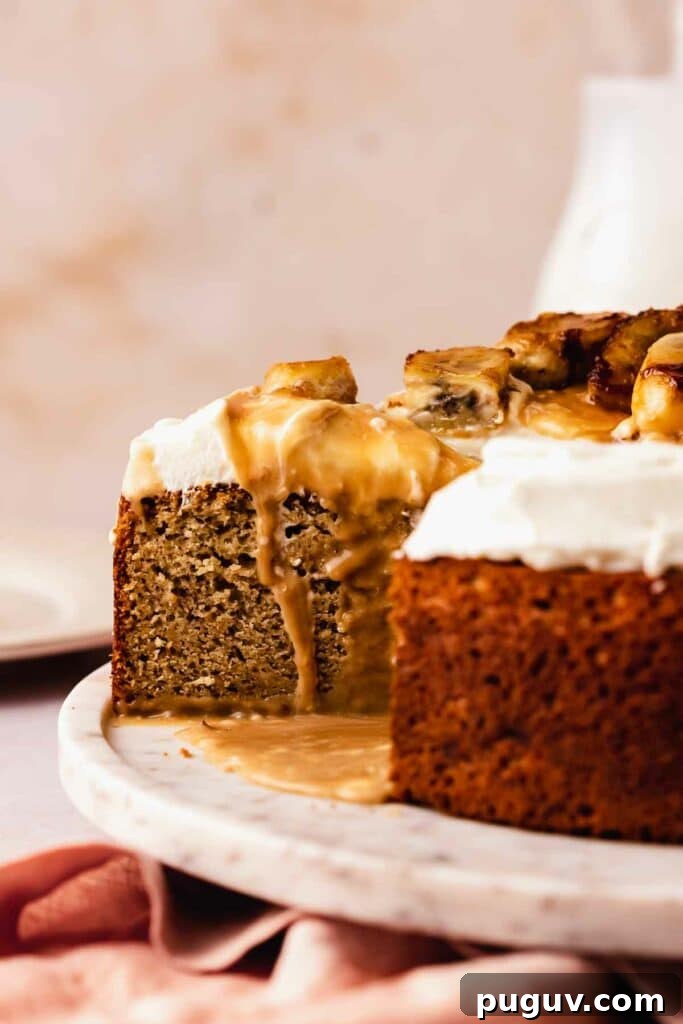 Decadent Banoffee Cake Recipe with Caramelized Banana Topping 6 slicing banoffee cake