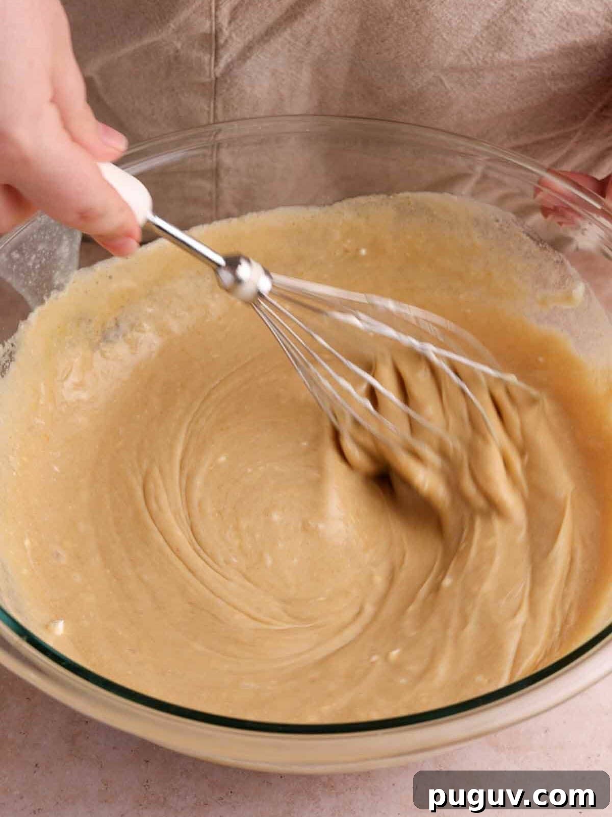 Decadent Banoffee Cake Recipe with Caramelized Banana Topping 7 add rest of wet ingredients and whisk