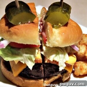 Grill a Perfect Burger: Tips for Juicy, Evenly Cooked Patties 10 Assembled Burger On A White Plate