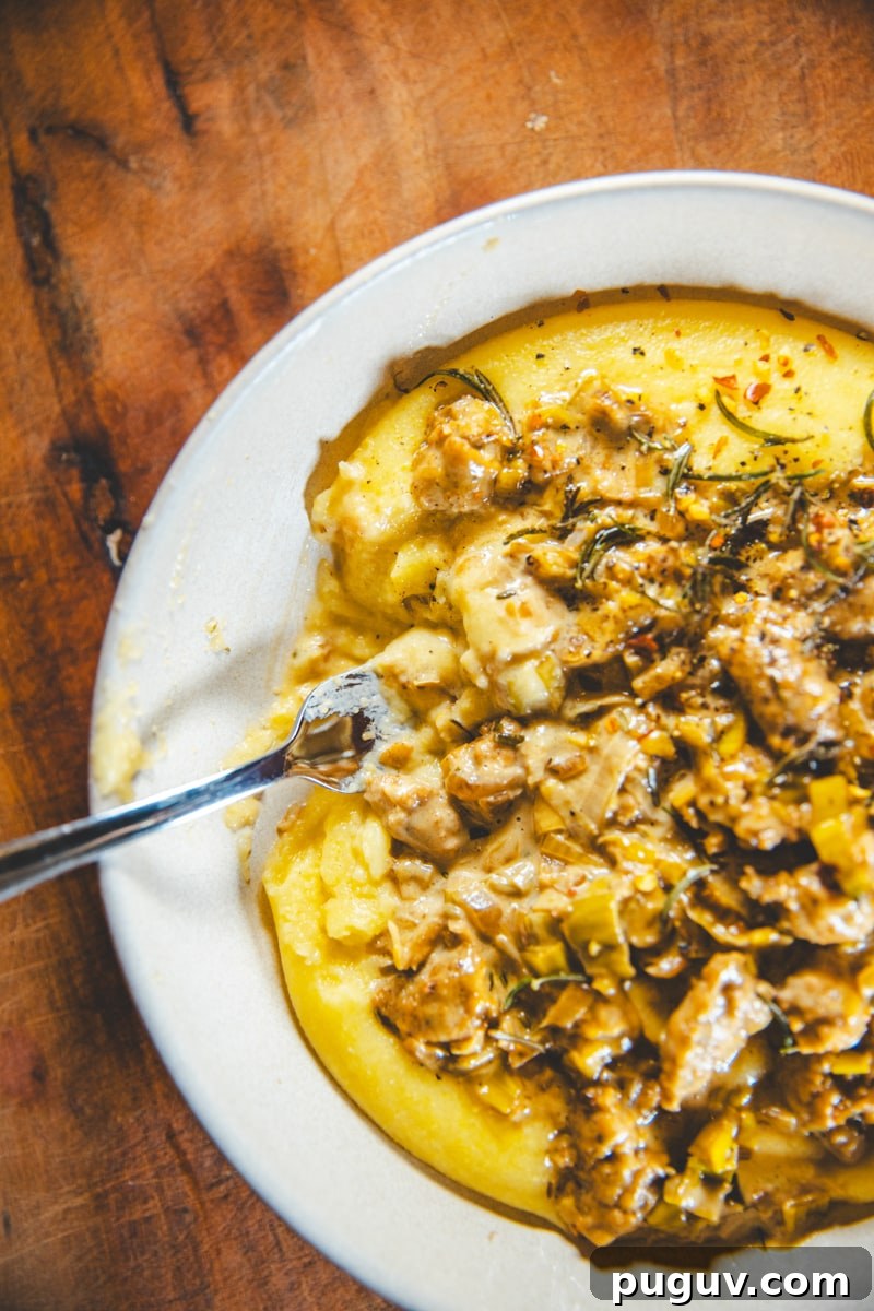 Sausage and Leek Ragu with Creamy Polenta Bowl 4 Eating the Sausage & Leek Ragu with Creamy Polenta - Georgie Eats