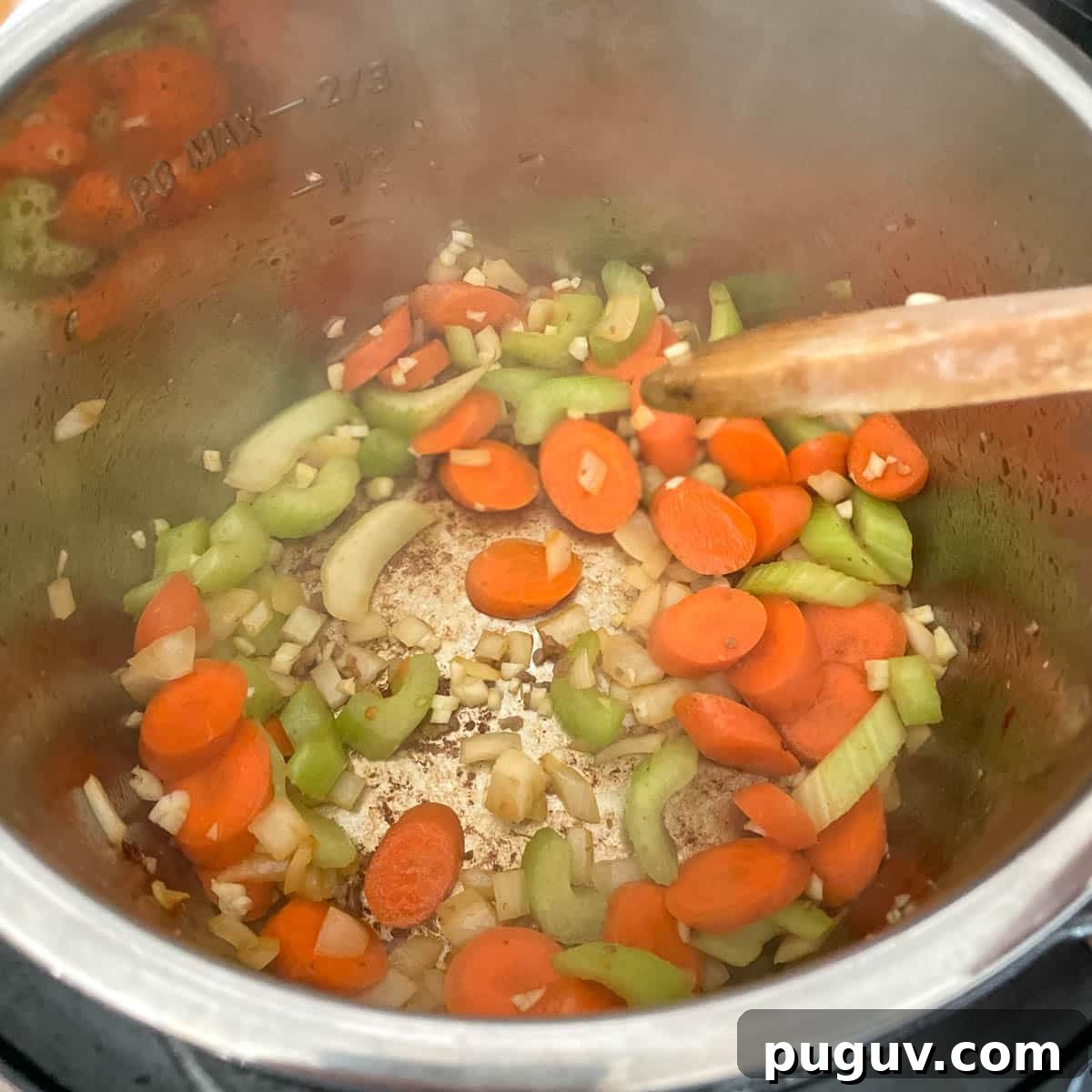 Creamy Instant Pot Tortellini Soup Recipe for Quick Weeknights 7 Garlic is added to the pot.
