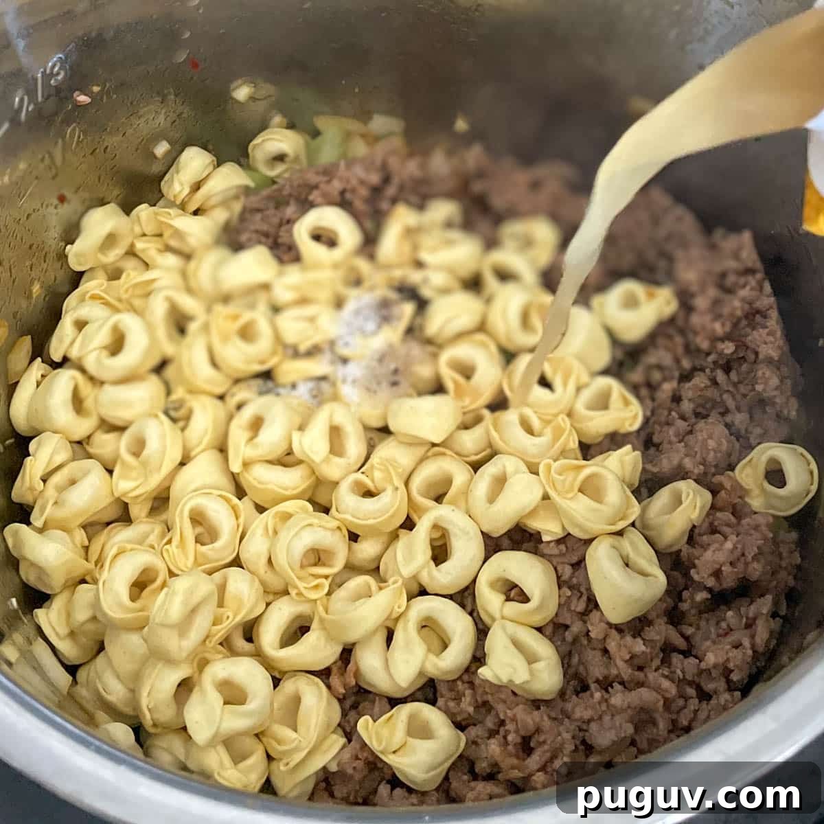 Creamy Instant Pot Tortellini Soup Recipe for Quick Weeknights 8 Tortellini, seasonings, sausage, and broth is added to the soup ingredients.