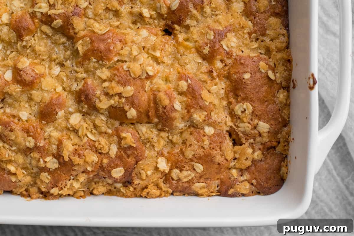 crisp top of coffee cake in a white pan