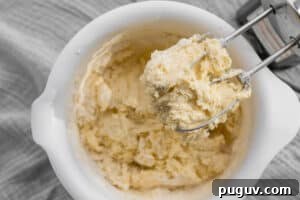 batter being mixed with hand mixer