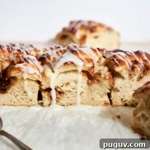 Sourdough Discard Cinnamon Roll Focaccia Recipe 14 A side view of Sourdough Discard Cinnamon Roll Focaccia.
