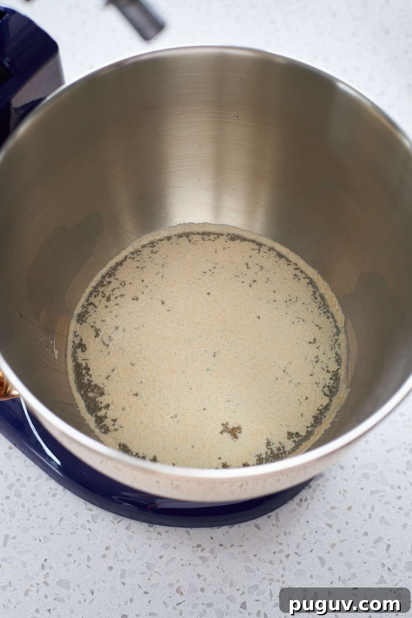 Sourdough Discard Cinnamon Roll Focaccia Recipe 4 Yeast blooming on warm water in a stand mixer.