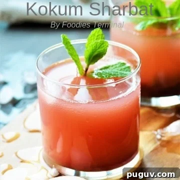 Refreshing Homemade Strawberry Lassi Recipe: Creamy Yogurt Drink 12 Kokum Sharbat served in a transparent glass