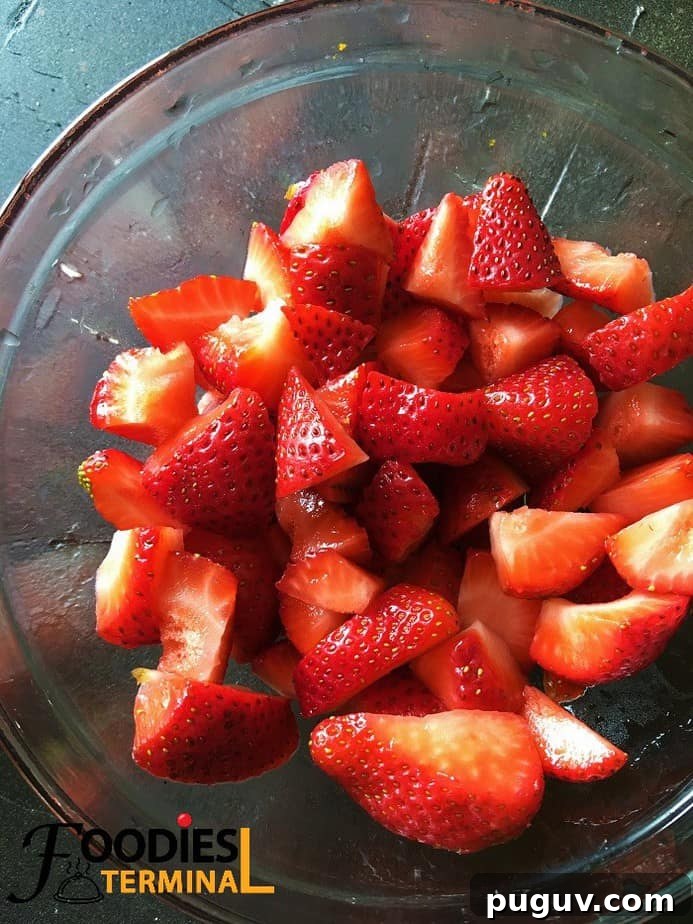 Refreshing Homemade Strawberry Lassi Recipe: Creamy Yogurt Drink 4 Juicy red diced strawberries ready to make lassi
