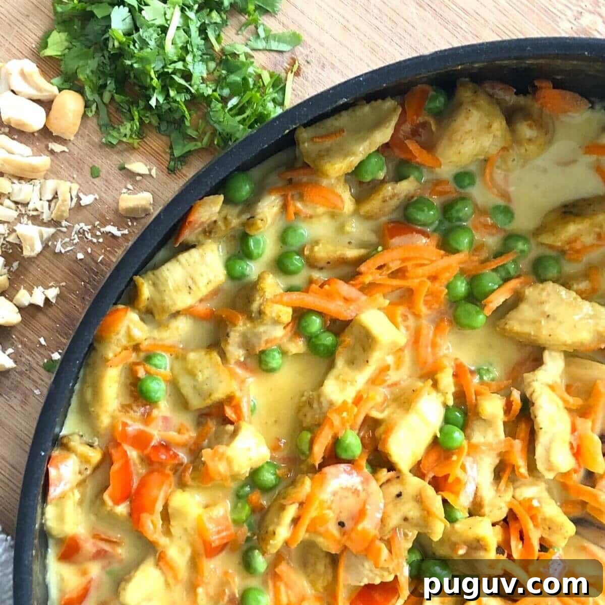 Authentic Thai Coconut Curry Chicken Recipe for Dinner 11 sauté pan with Thai coconut curry chicken.