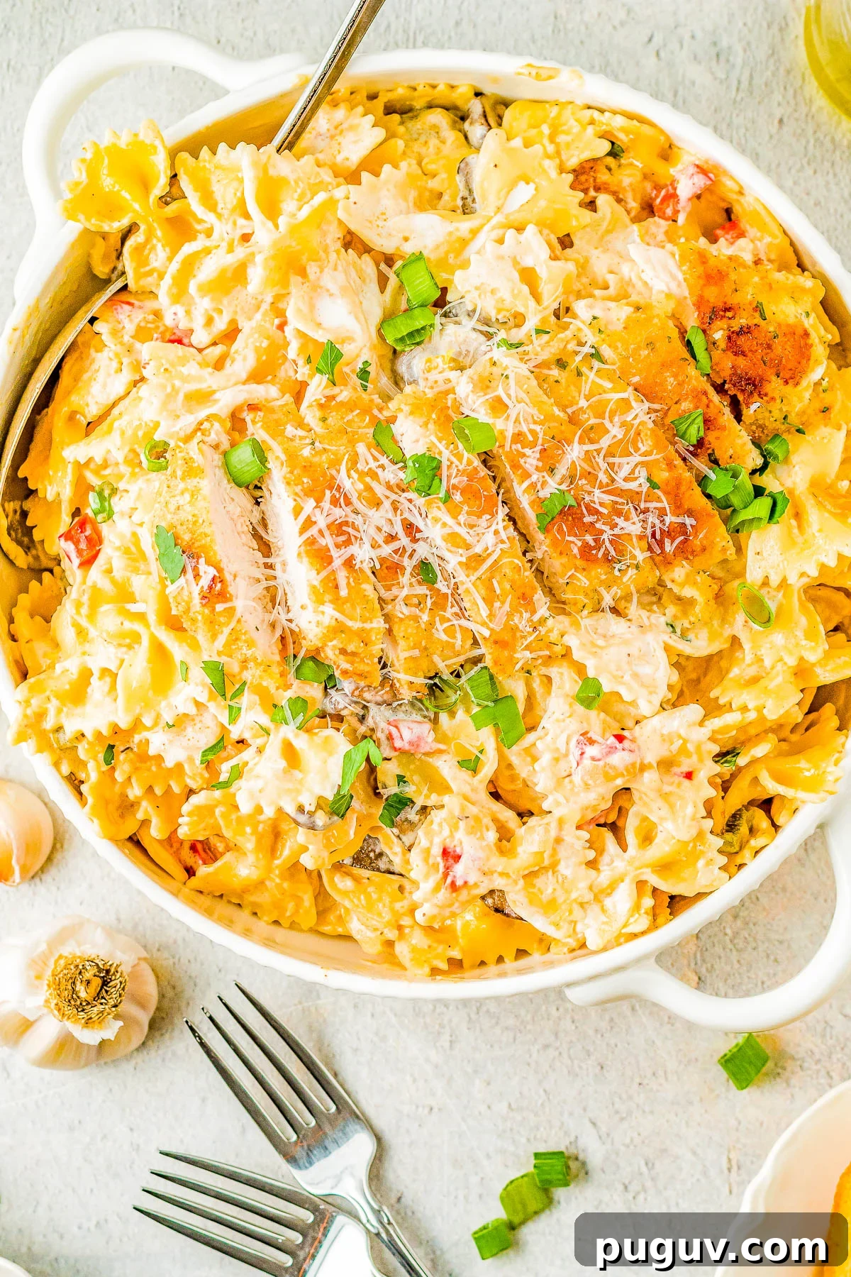 Creamy Cajun Chicken Pasta in a circular dish.