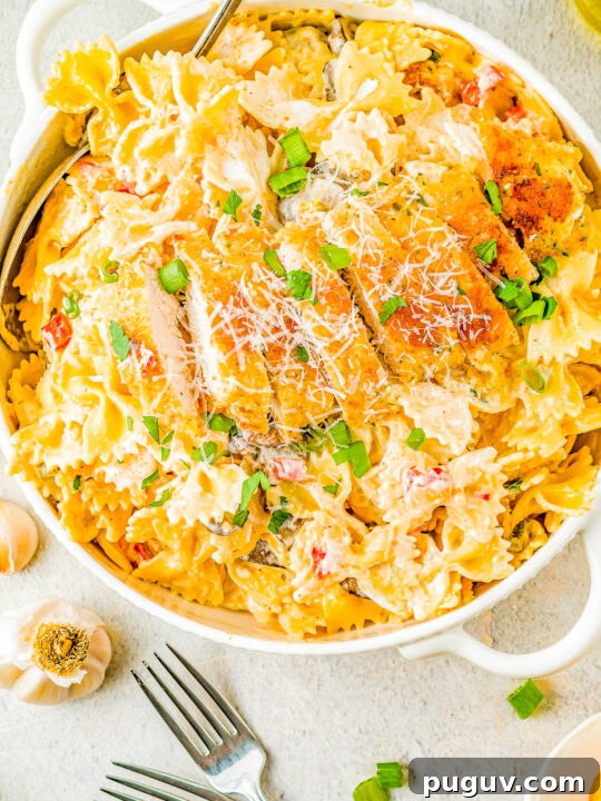 Cajun chicken pasta in a round dish.