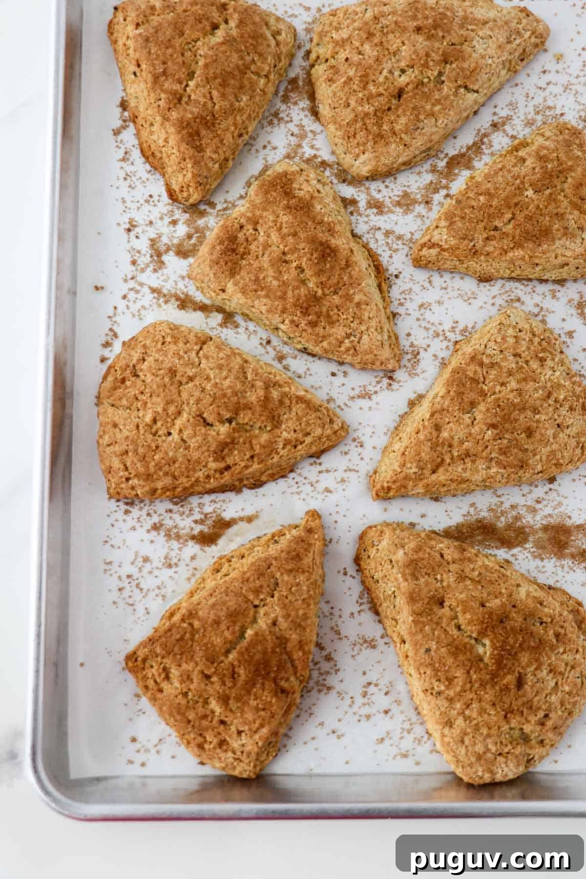 Brown Sugar Cardamom Scones Recipe for Tender, Buttery Pastries 11 Overhead view of Brown Sugar Cardamom Scones on a plate.