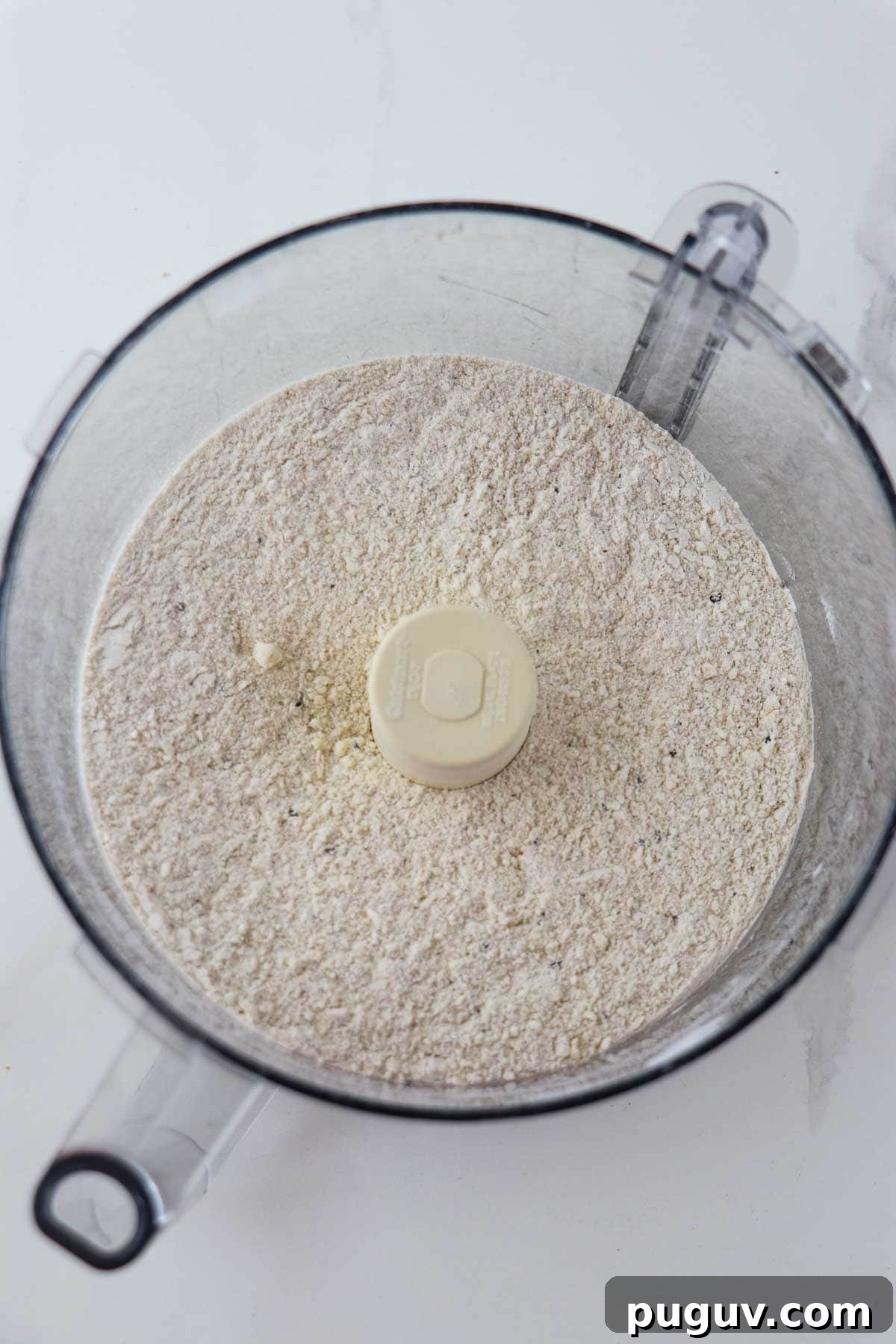 Brown Sugar Cardamom Scones Recipe for Tender, Buttery Pastries 5 Dry ingredients in the work bowl of a food processor.