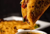 Smoked Birria Tacos with Melted Queso and Consomme