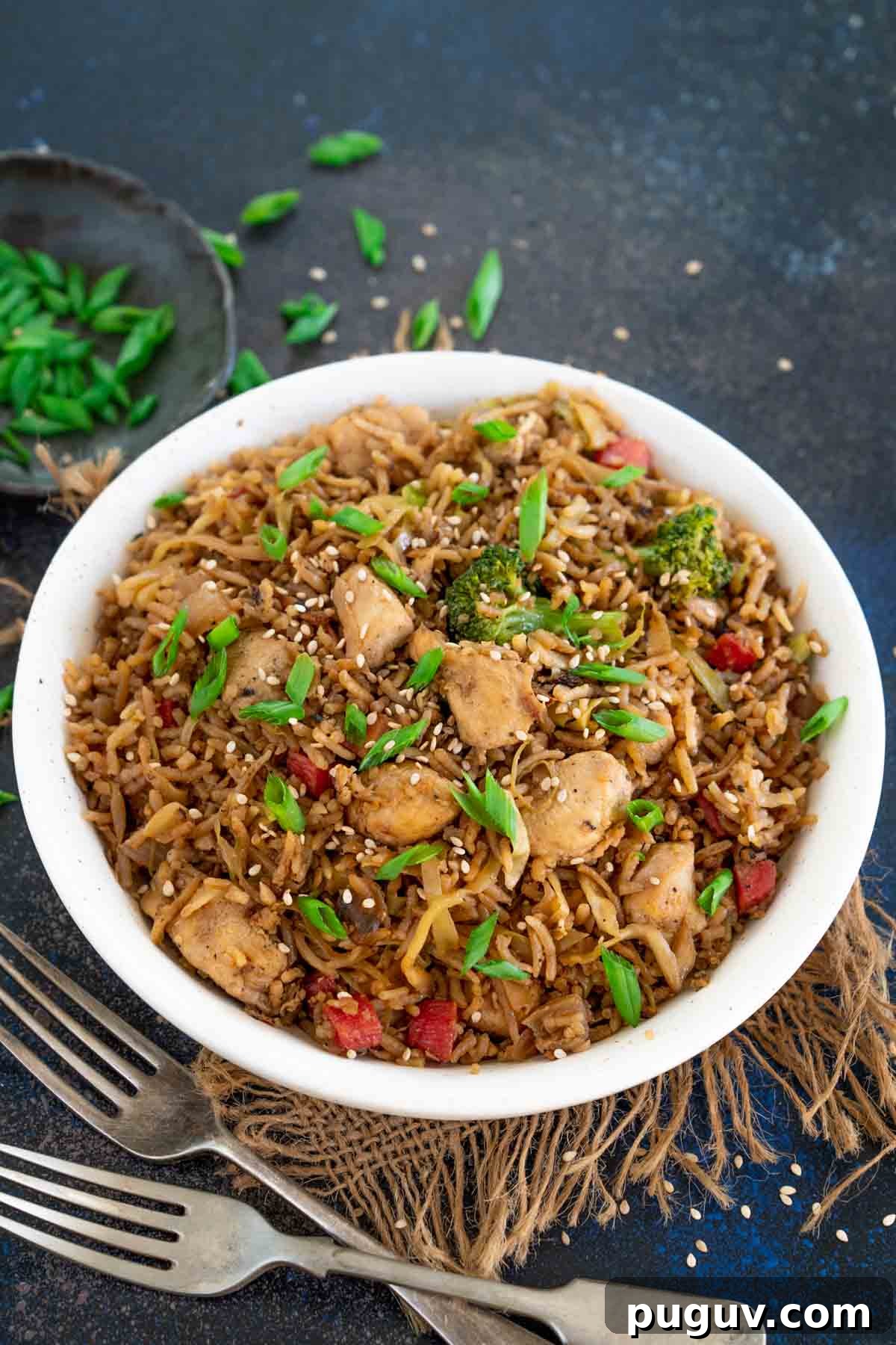 Teriyaki chicken fried rice served in a bowl.