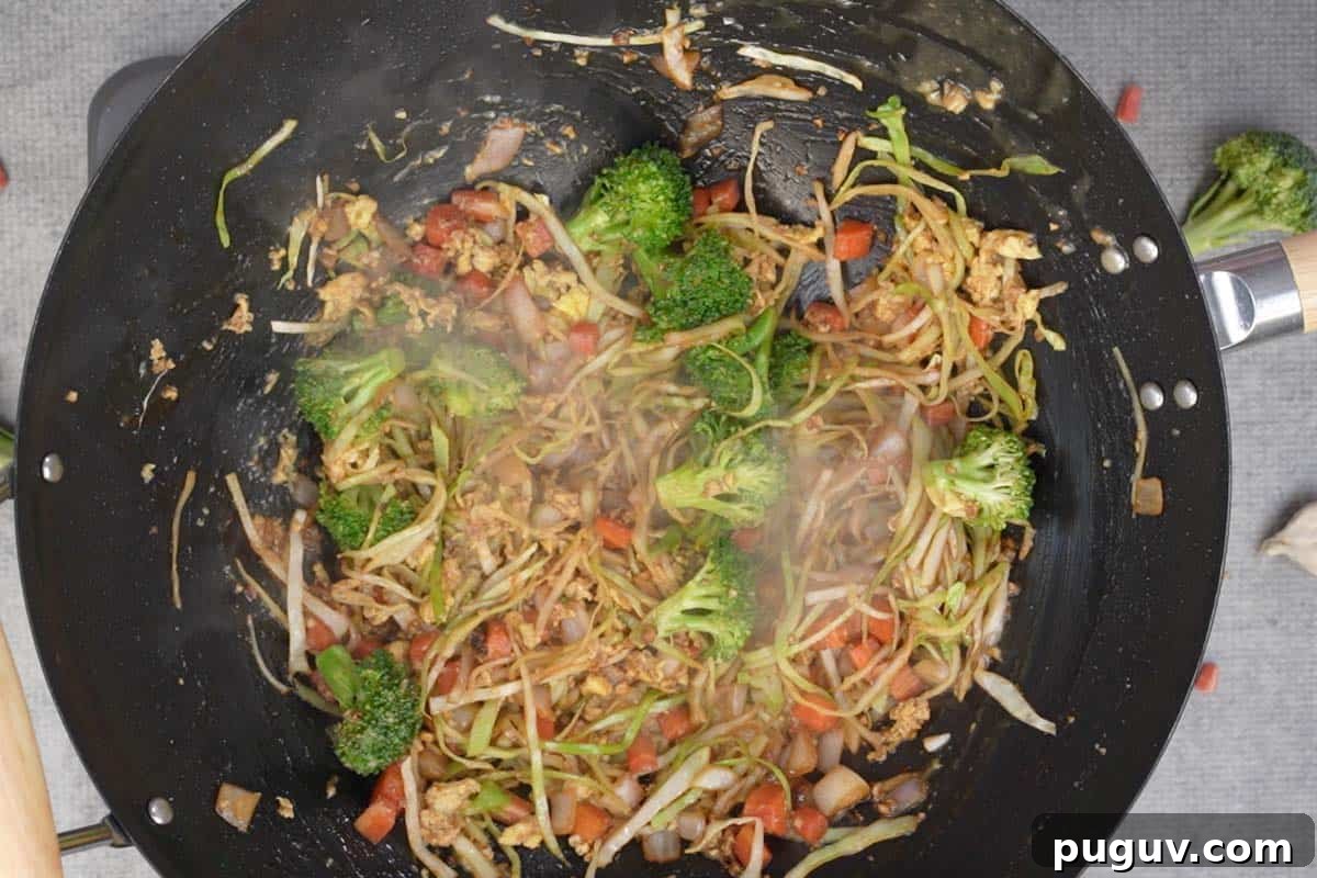 Scrambled eggs mixed with the veggies.