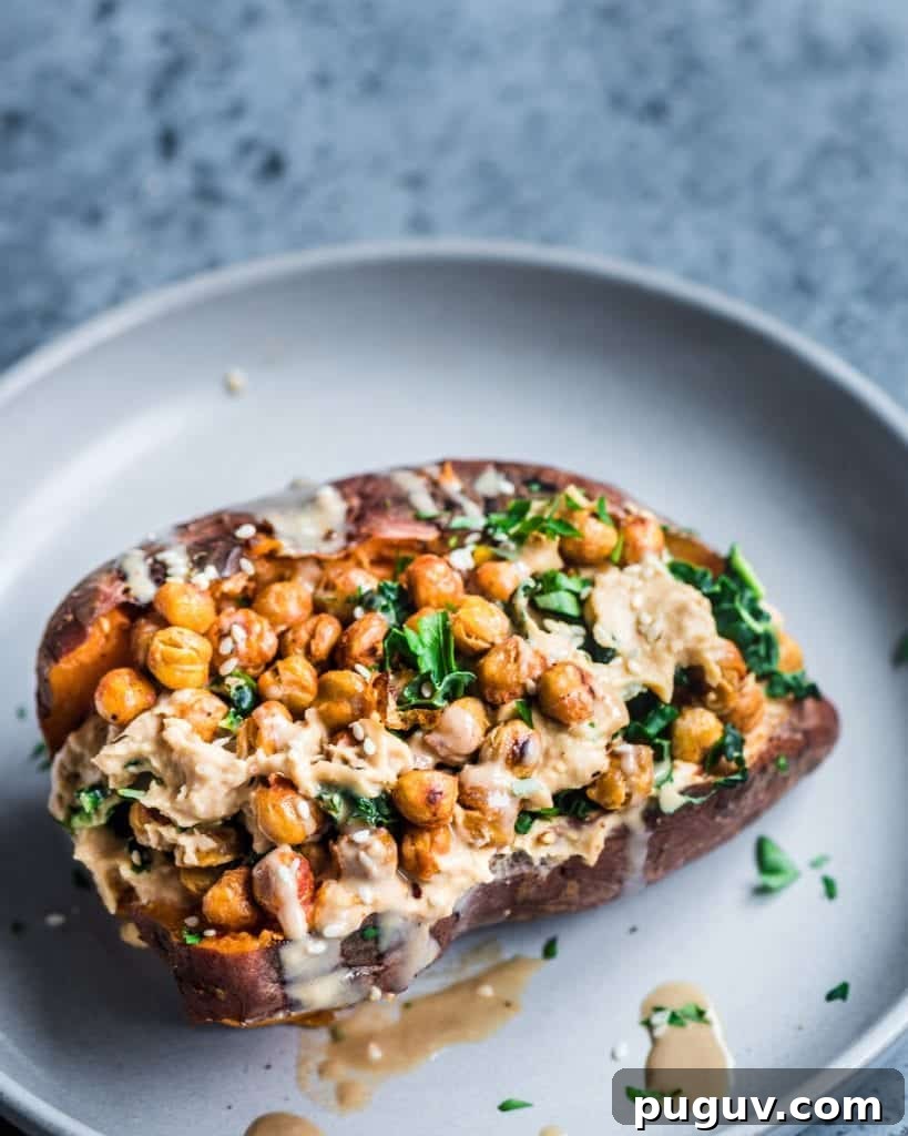 chickpea, kale and hummus stuffed sweet potato