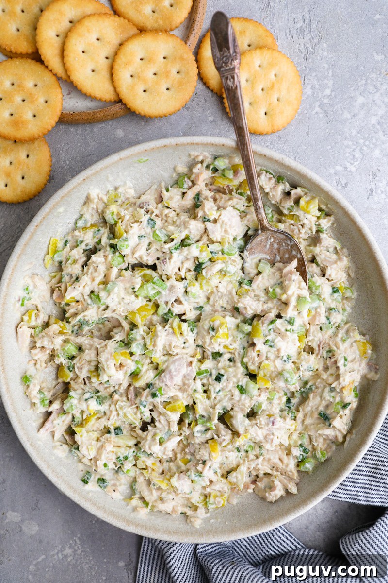 A large shallow bowl filled with freshly made pepperoncini tuna salad