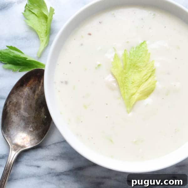 seafood béchamel in a bowl with spoon