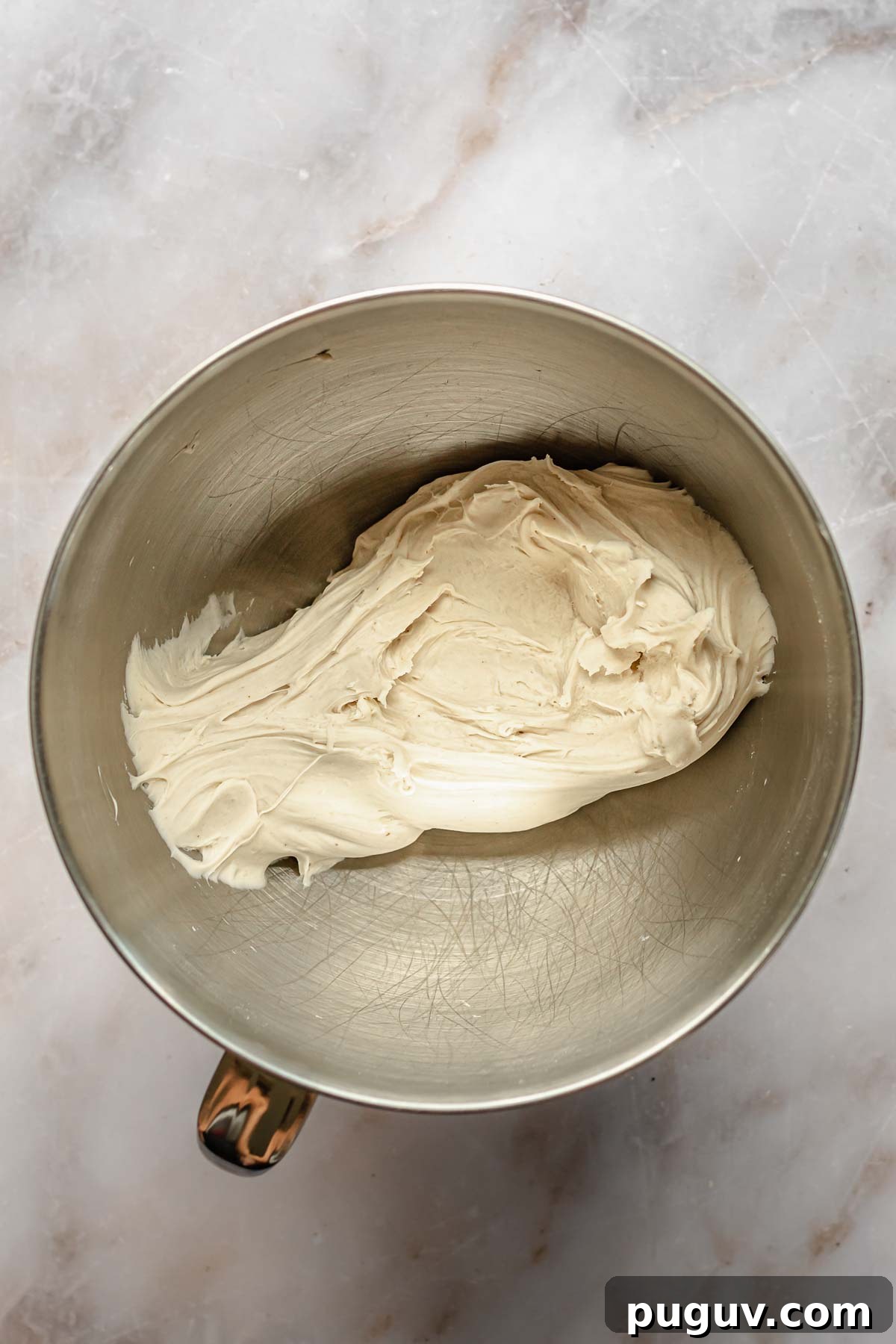 Finished dough in a stand mixer bowl.