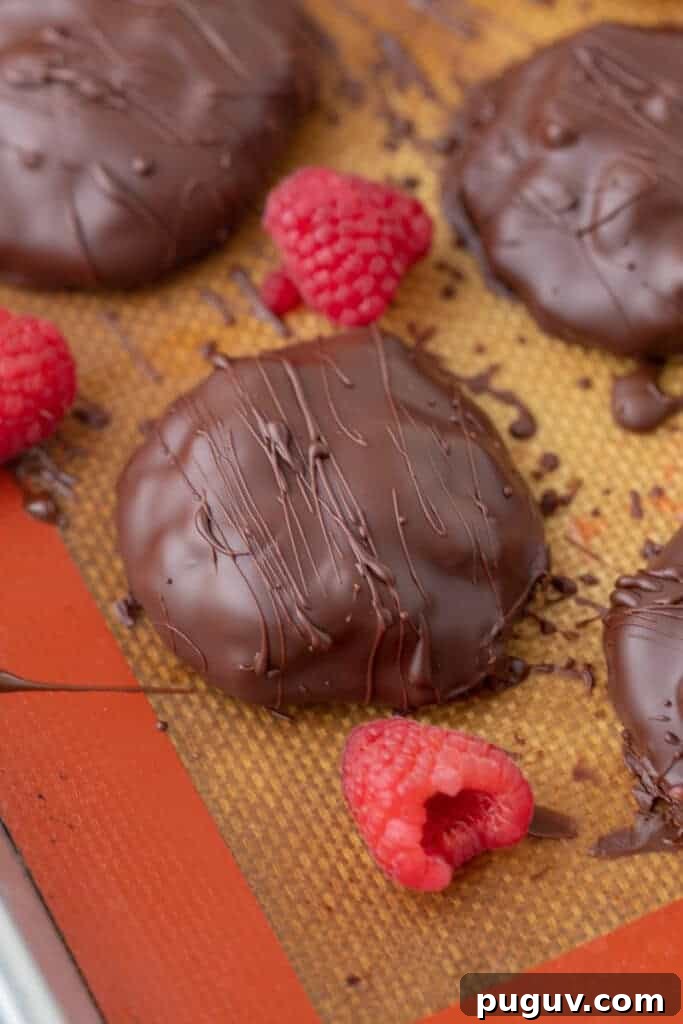 Chocolate covered raspberry jam clusters