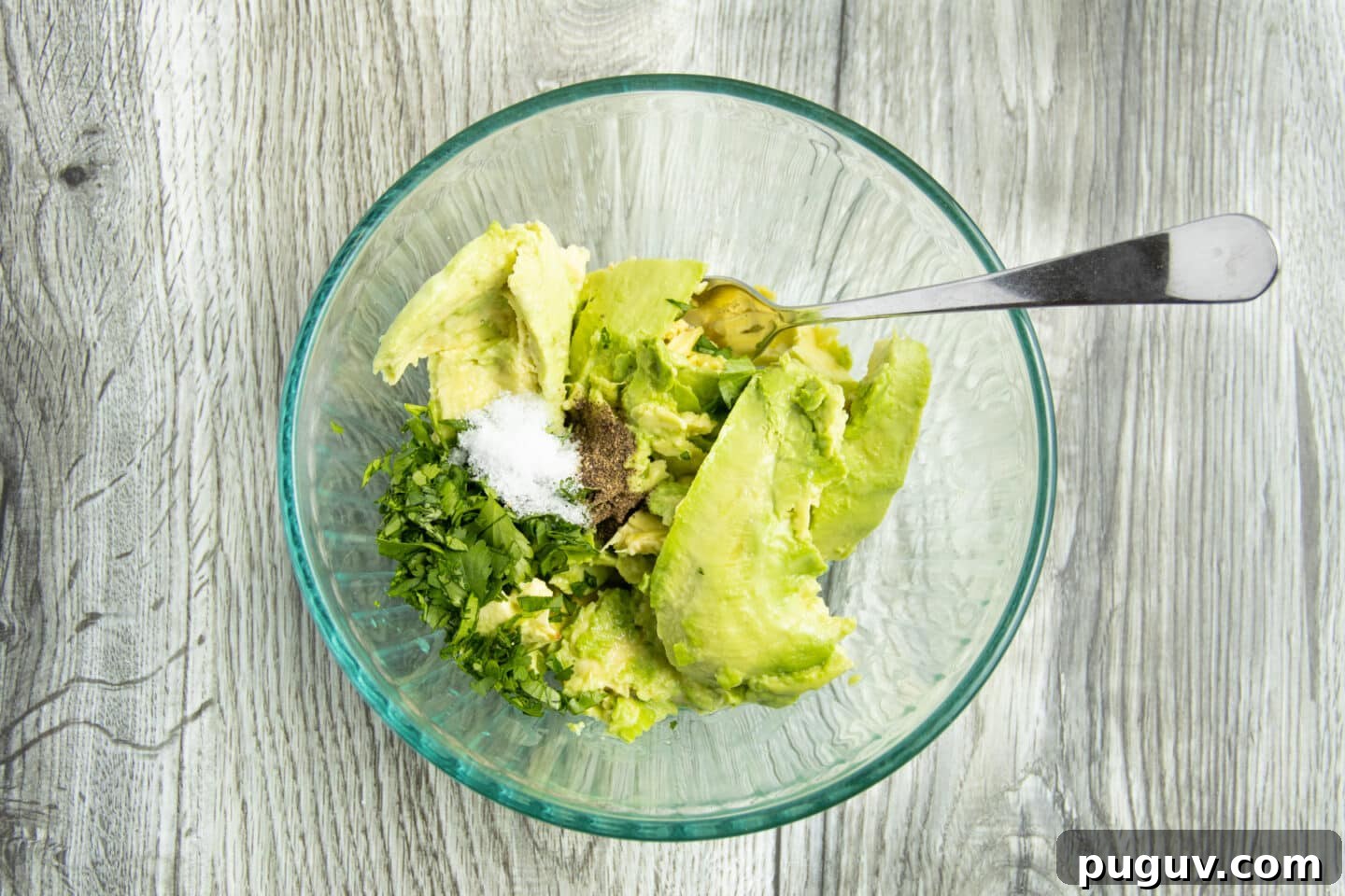 This is a picture of the ingredients in a bowl before being smashed.
